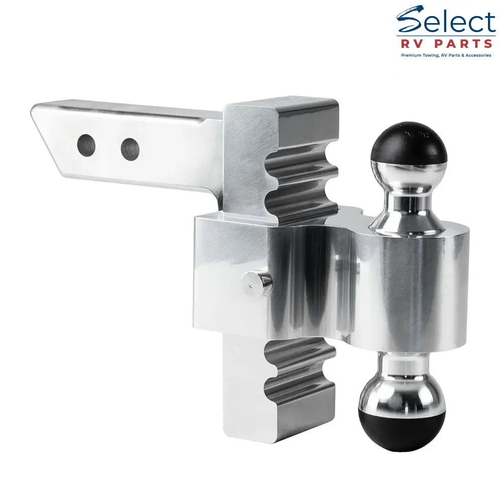 Metal trailer hitch with two ball attachments on a white background